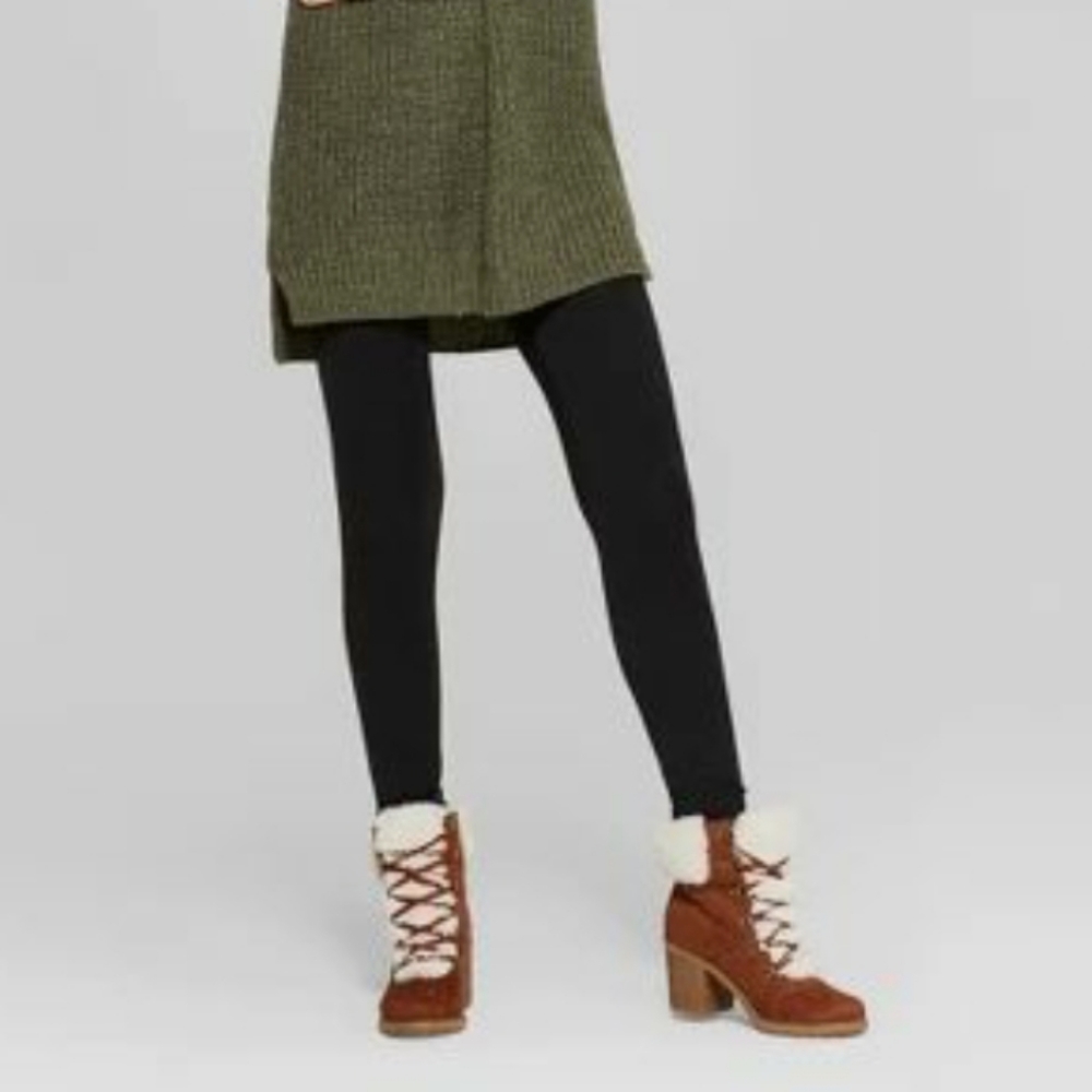 Heeled hiker boot with faux fur